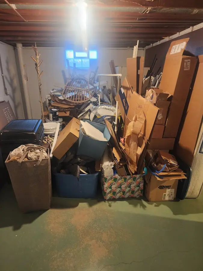 Roll-off dumpster container at job site for 4 Yard Dumpster Rental in Hopedale